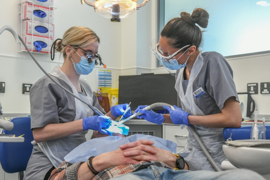 Students examining patients